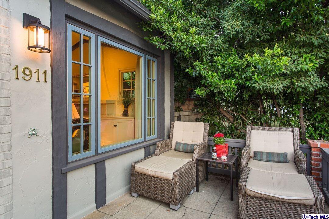 1911 Pepper Drive Altadena, CA 91001 - Photo 28 of 28 a backyard of a house with sofas fire pit and outdoor seating