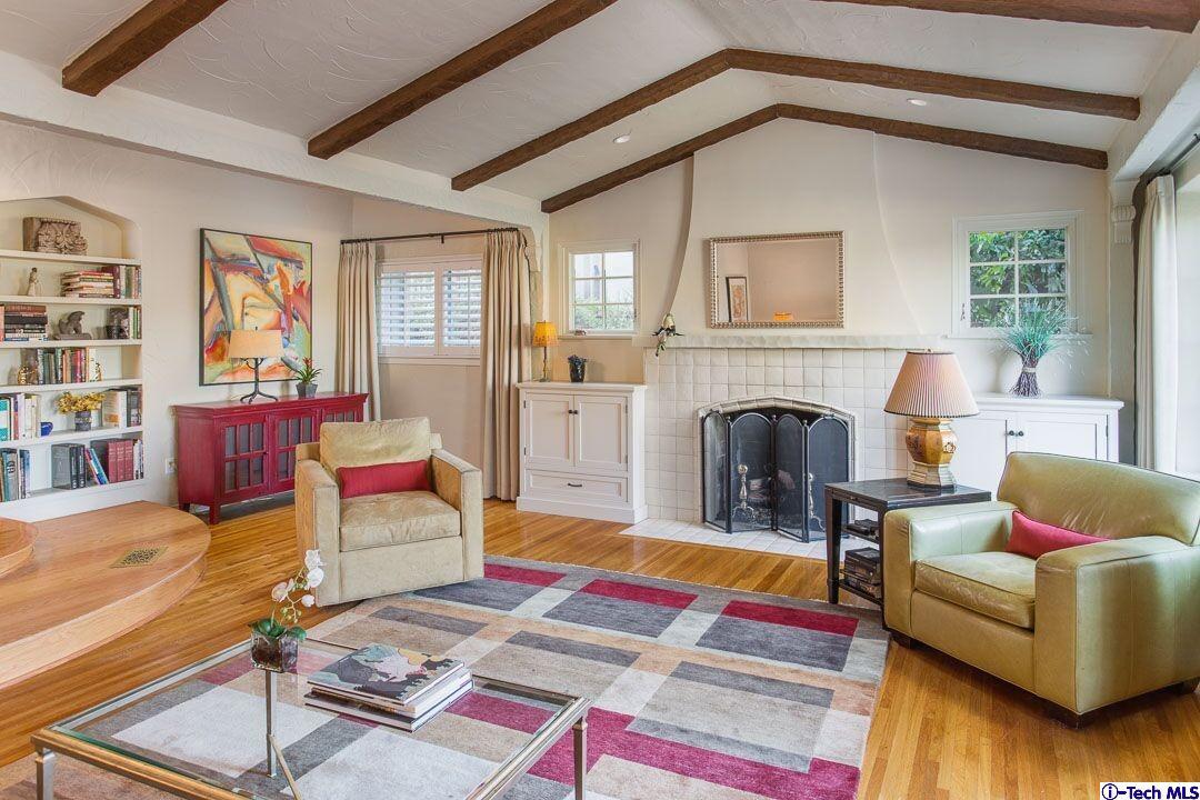1911 Pepper Drive Altadena, CA 91001 - Photo 5 of 28 a living room with furniture fireplace and rug