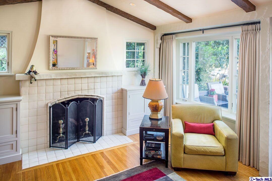 1911 Pepper Drive Altadena, CA 91001 - Photo 6 of 28 a living room with furniture and a fireplace