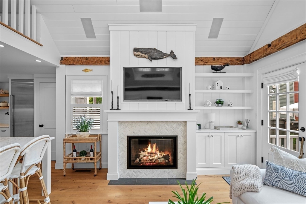31 Franklin Street Marblehead, MA 01945 - Photo 10 of 35 a living room with furniture and a fireplace