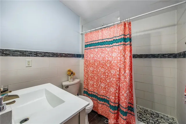 a bathroom with a sink and a shower