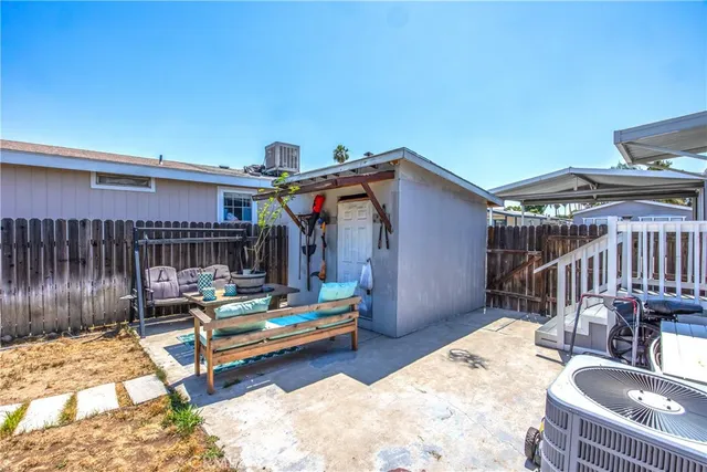 a view of a swimming pool with a patio