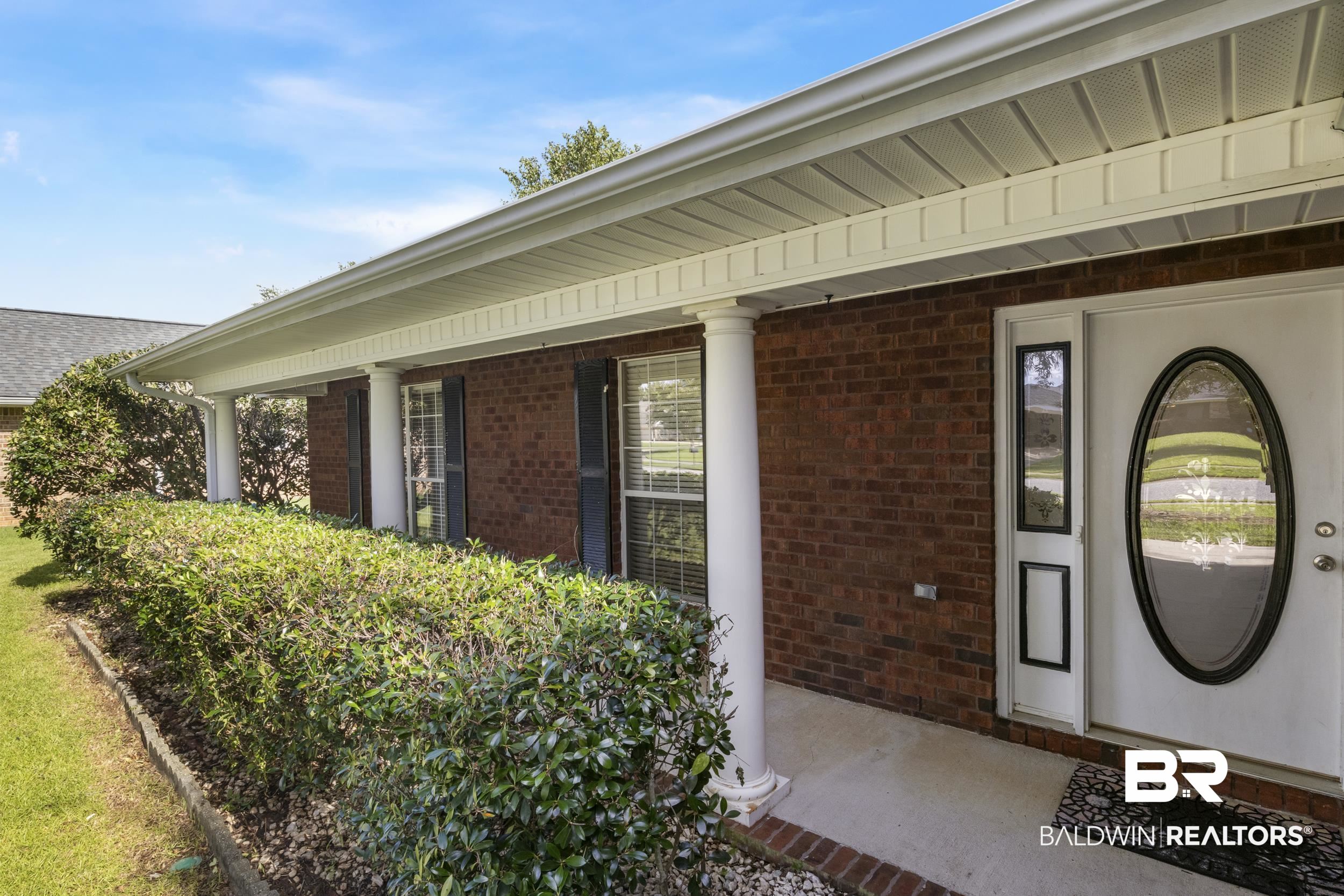 9610 Watkins Drive Fairhope, AL 36532 - Photo 18 of 26 Property entrance featuring covered porch