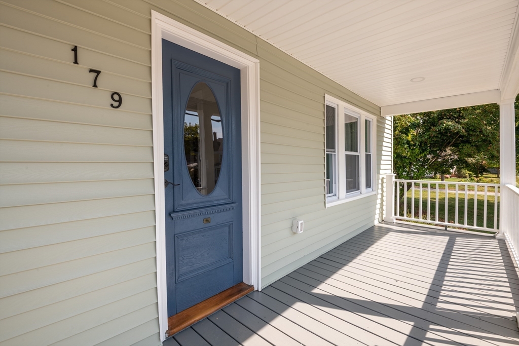 179 Lions Mouth Road Amesbury, MA 01913 - Photo 2 of 42 a view of a balcony with wooden floor