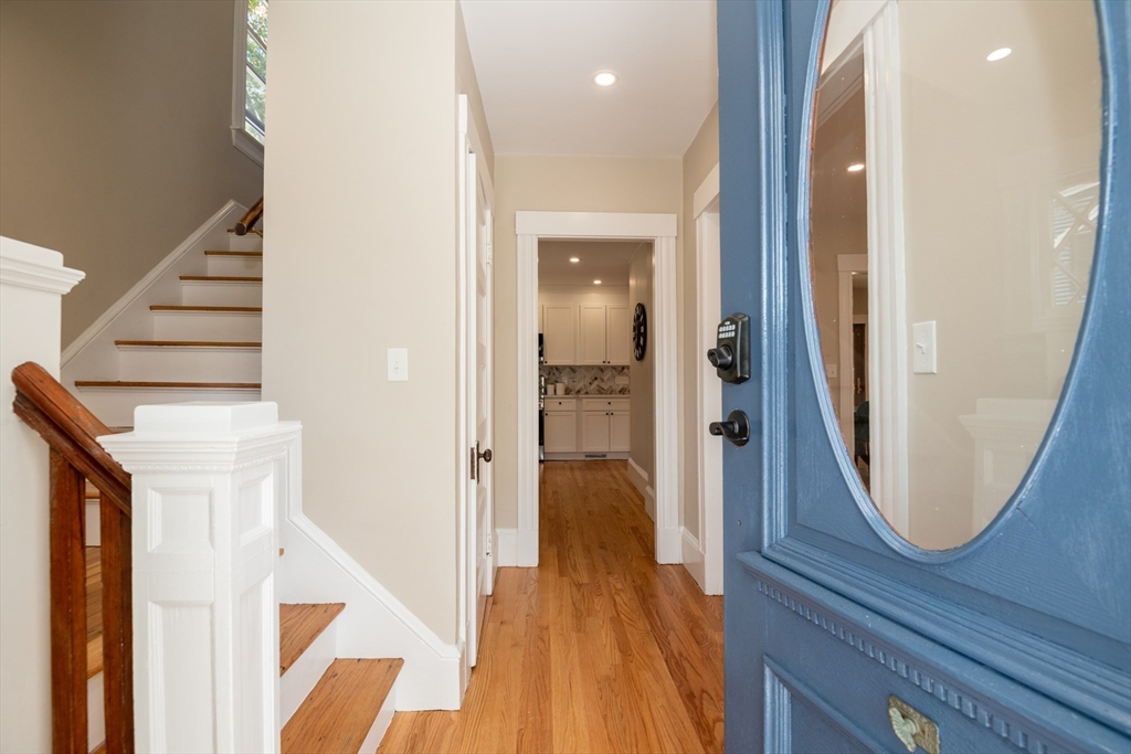 179 Lions Mouth Road Amesbury, MA 01913 - Photo 3 of 42 a view of a hallway with wooden floor and entryway