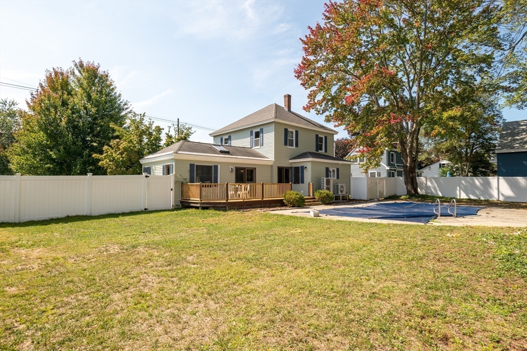 179 Lions Mouth Road Amesbury, MA 01913 - Photo 39 of 42 a front view of a house with swimming pool