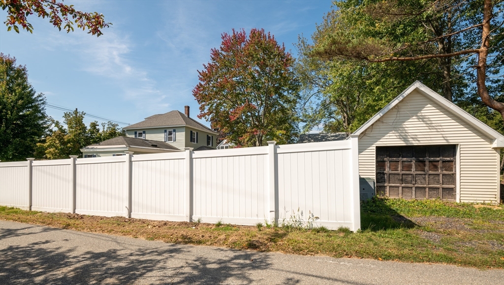 179 Lions Mouth Road Amesbury, MA 01913 - Photo 41 of 42 a backyard of a house
