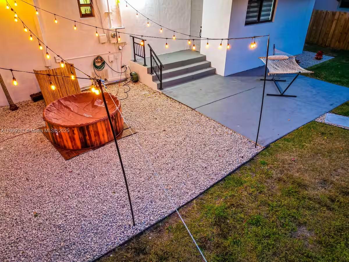 271 Northwest 143rd Street Miami, FL 33168 - Photo 36 of 43 a view of a backyard with furniture