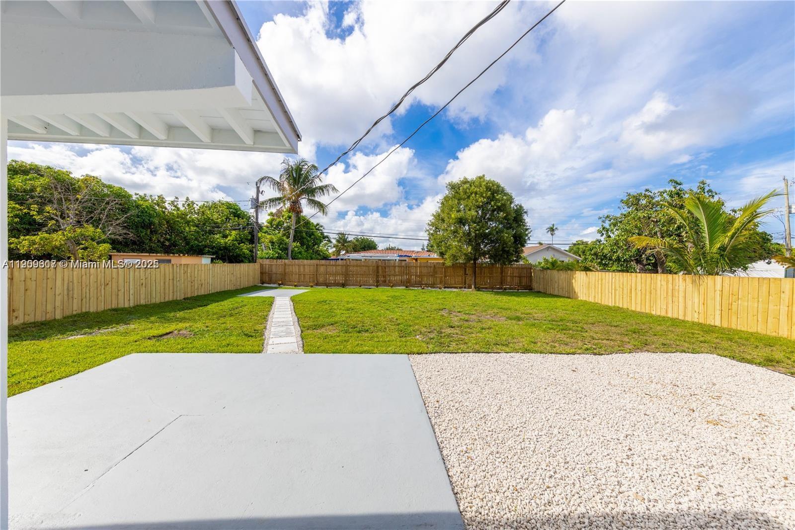 271 Northwest 143rd Street Miami, FL 33168 - Photo 37 of 43 a view of backyard with swimming pool
