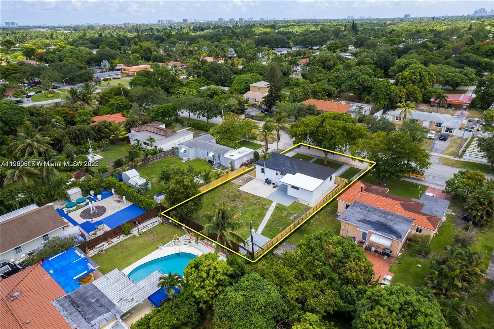 271 Northwest 143rd Street Miami, FL 33168 - Photo 43 of 43 an aerial view of a house with a garden