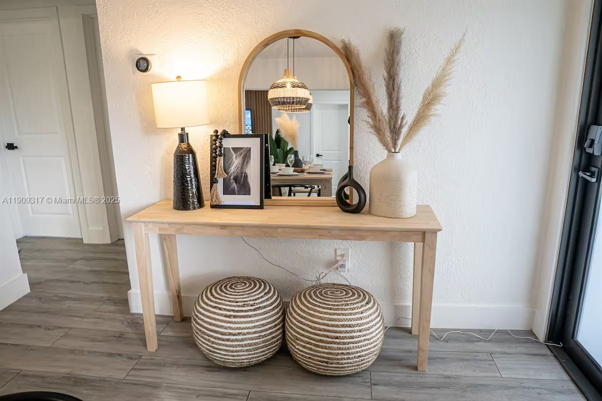 271 Northwest 143rd Street Miami, FL 33168 - Photo 6 of 43 a view of hall with wooden floor