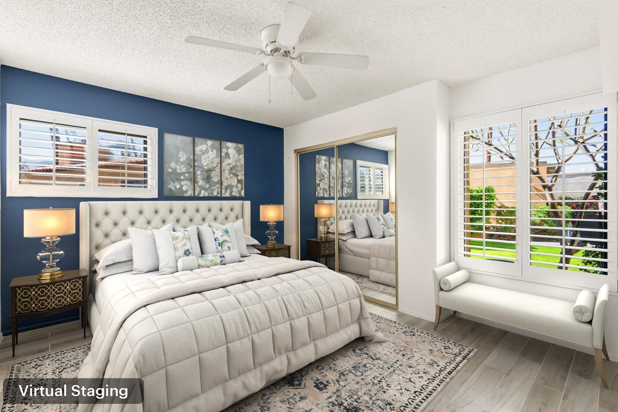 74171 Santa Rosa Circle Palm Desert, CA 92260 - Photo 14 of 32 a spacious bedroom with a large bed and a couch