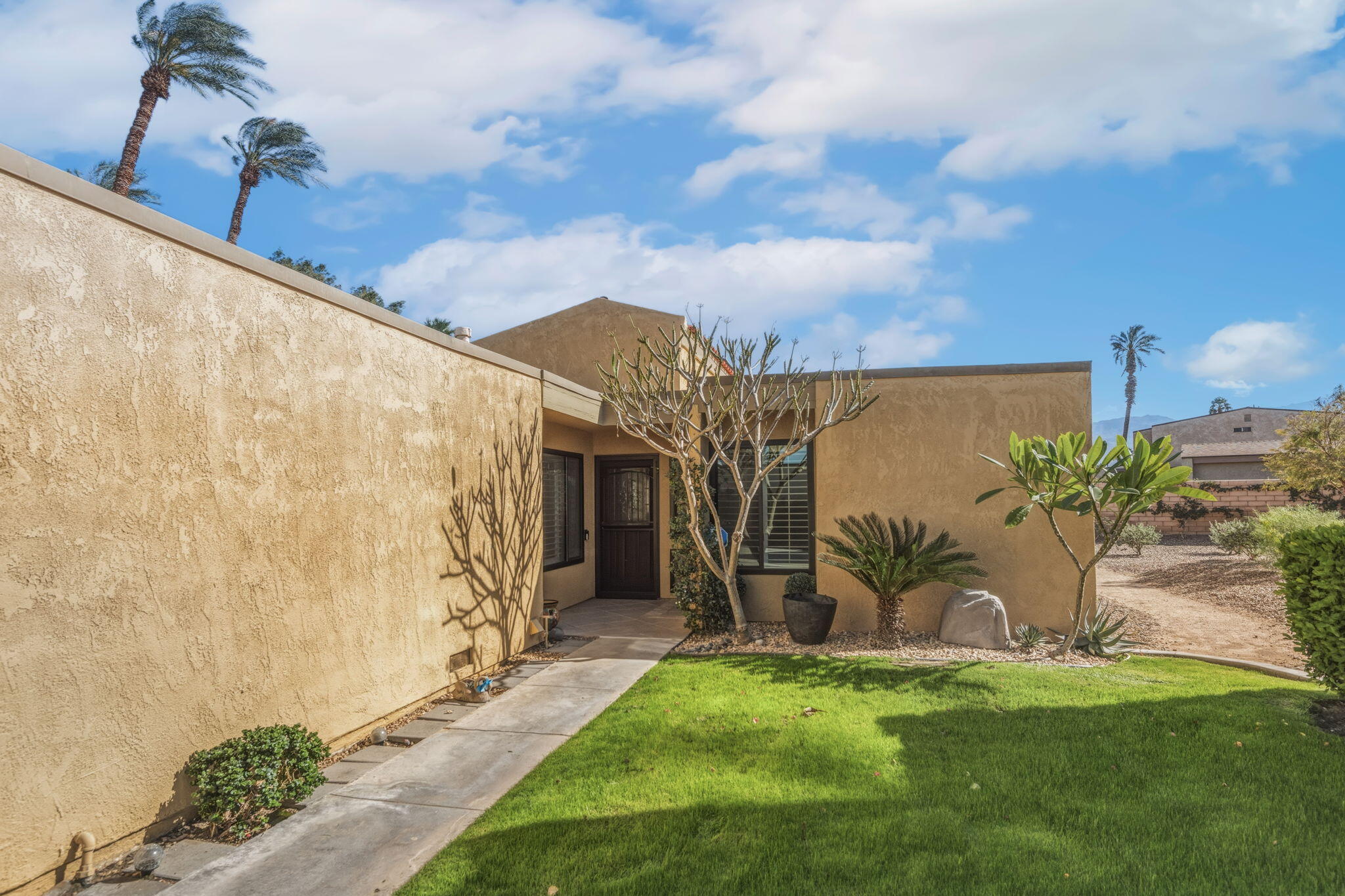 74171 Santa Rosa Circle Palm Desert, CA 92260 - Photo 2 of 32 a view of a backyard