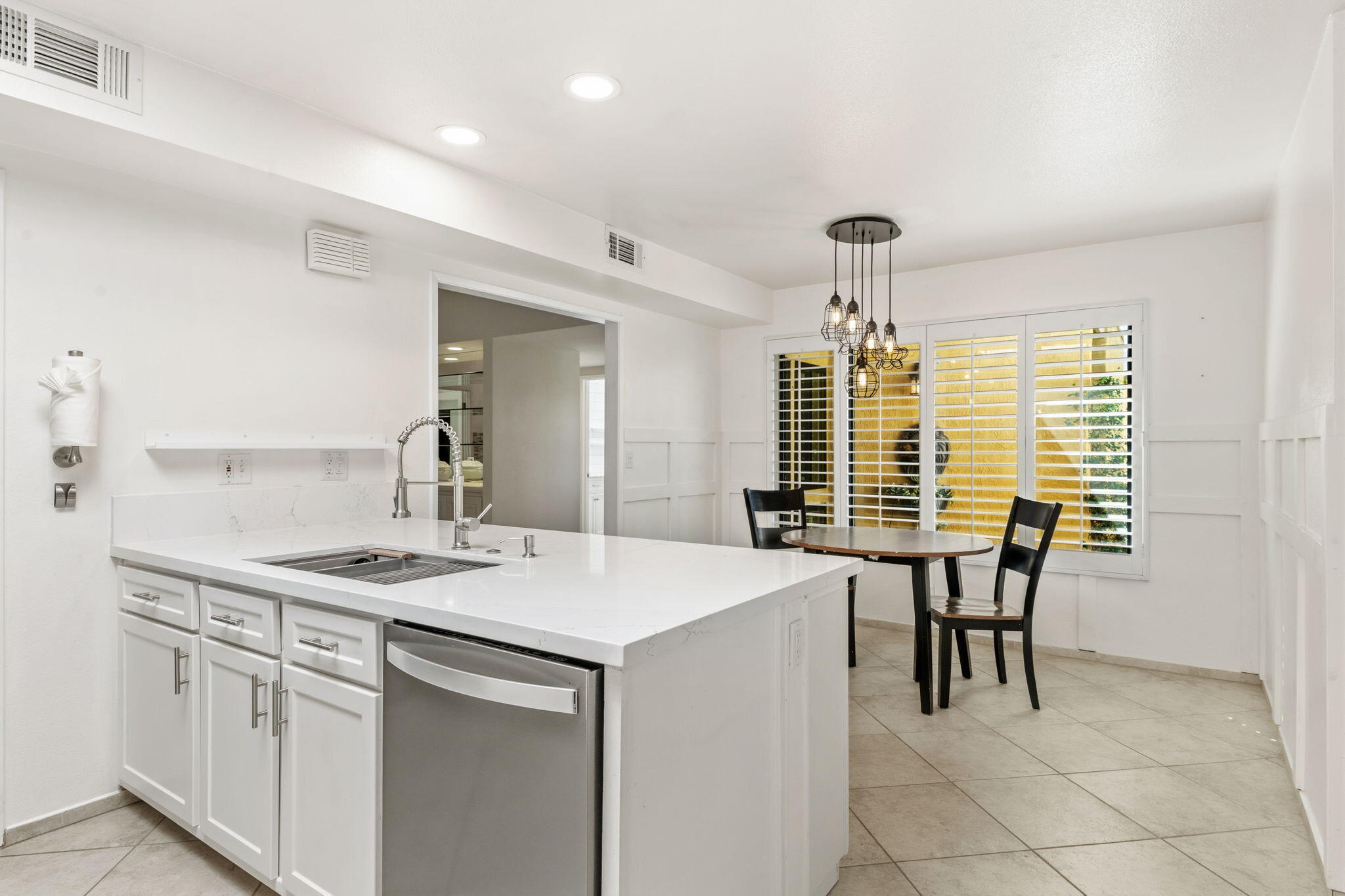 74171 Santa Rosa Circle Palm Desert, CA 92260 - Photo 10 of 32 a view of dining table chairs and chandelier