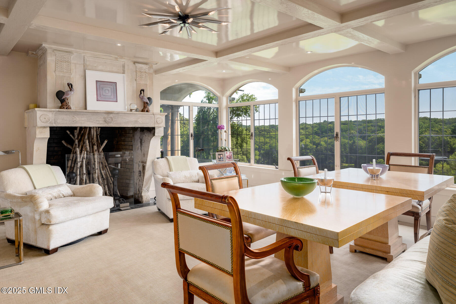 1233 Rock Rimmon Road Stamford, CT 06903 - Photo 12 of 50 a living room with fireplace furniture and a large window