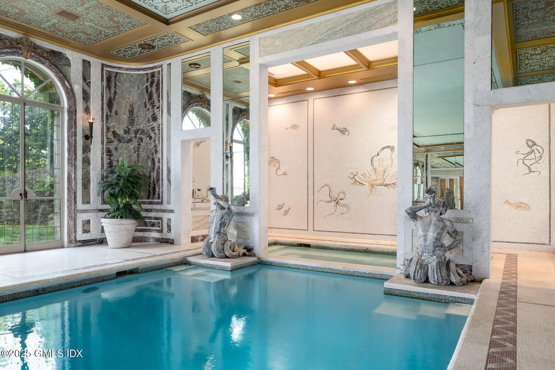 1233 Rock Rimmon Road Stamford, CT 06903 - Photo 23 of 50 a bathroom with a tub a mirror and window