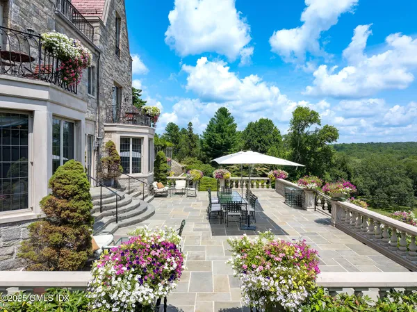 a view of a garden with houses