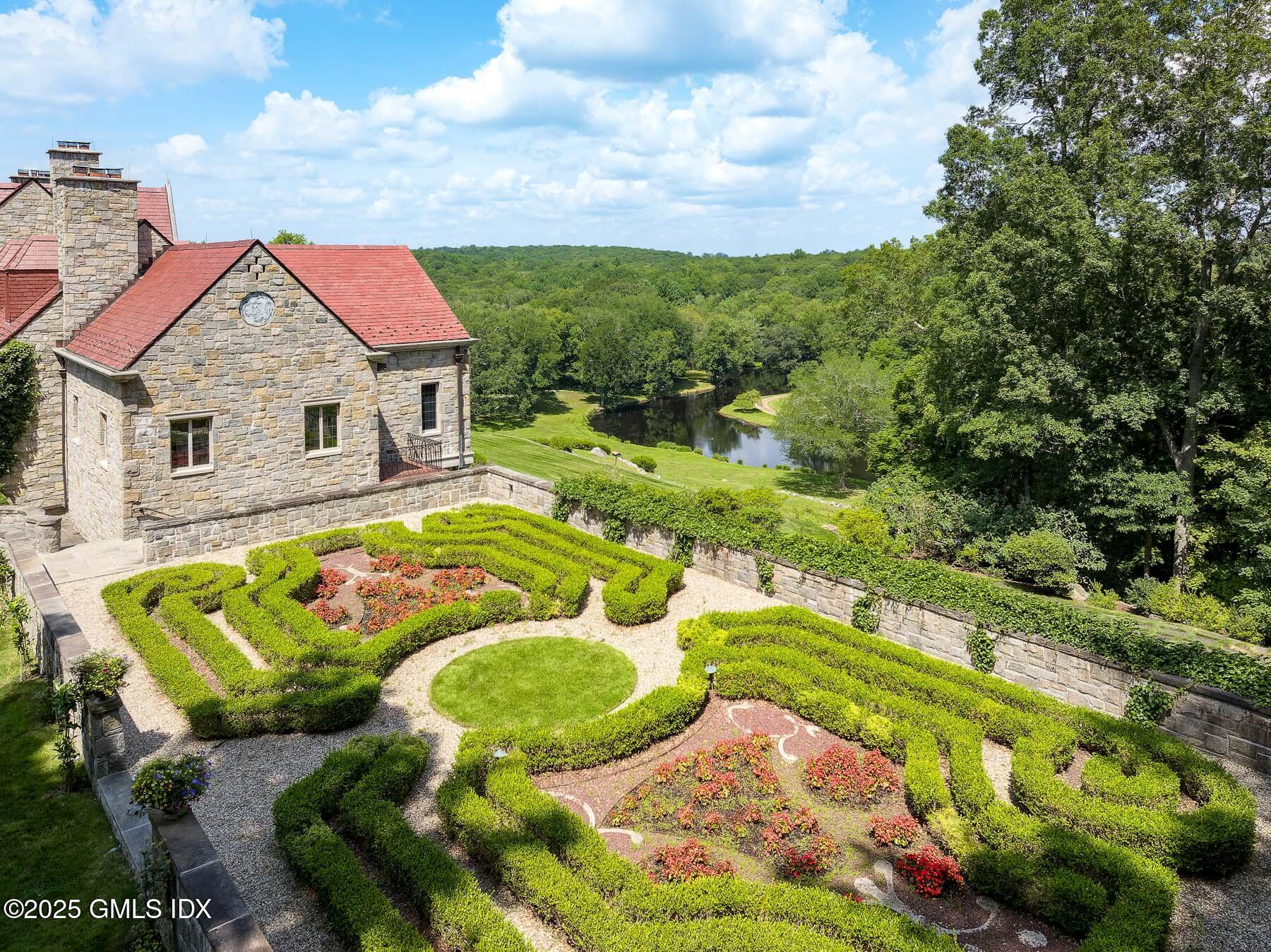 1233 Rock Rimmon Road Stamford, CT 06903 - Photo 27 of 50 a view of an house with a backyard and porch