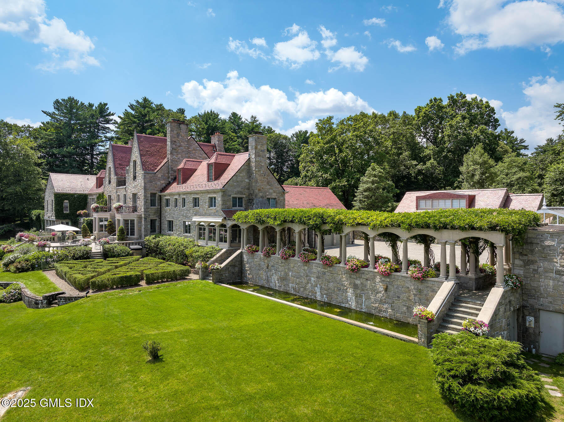 1233 Rock Rimmon Road Stamford, CT 06903 - Photo 29 of 50 a aerial view of a house with swimming pool garden and patio