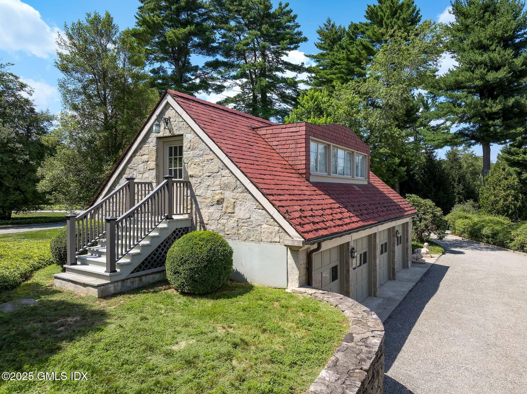 1233 Rock Rimmon Road Stamford, CT 06903 - Photo 36 of 50 a view of a house with a yard