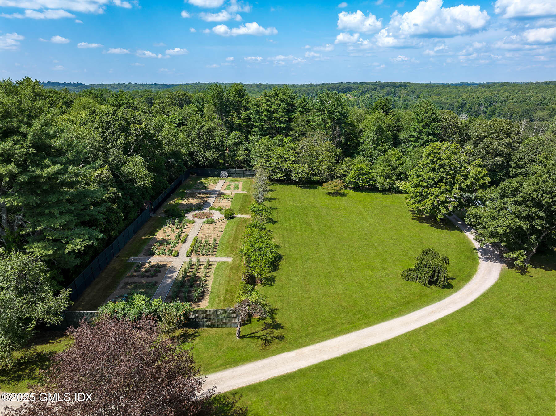 1233 Rock Rimmon Road Stamford, CT 06903 - Photo 38 of 50 a view of a back yard of a house with a swimming pool