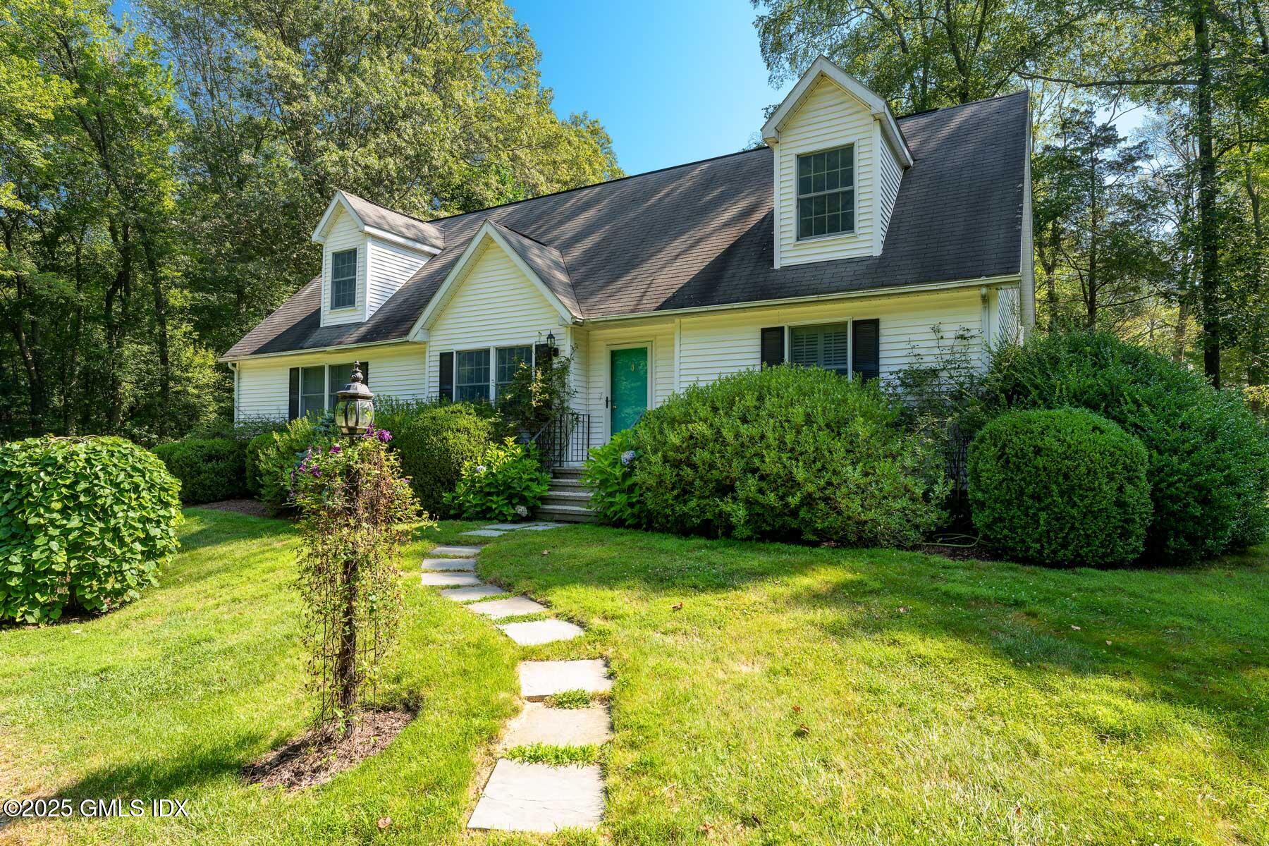 1233 Rock Rimmon Road Stamford, CT 06903 - Photo 48 of 50 a house view with a garden space
