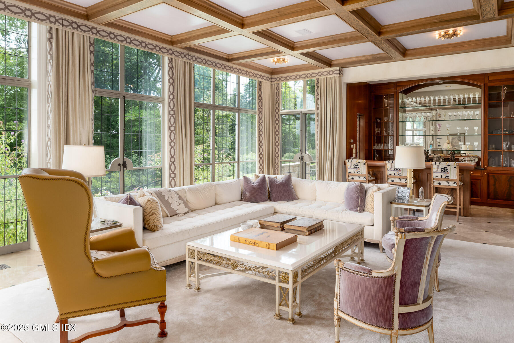 1233 Rock Rimmon Road Stamford, CT 06903 - Photo 7 of 50 a living room with furniture a large window and wooden floor