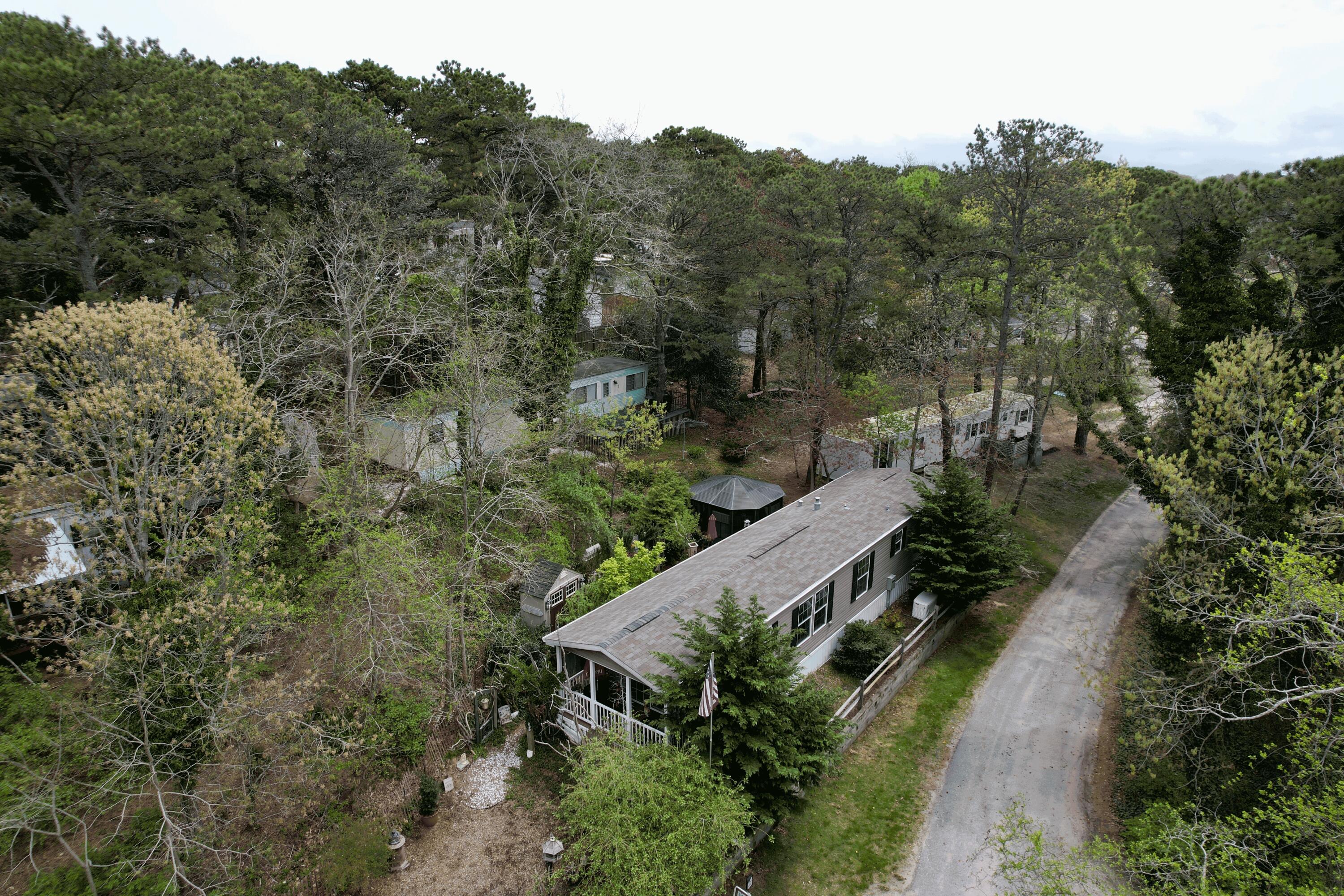 210 West Road, Unit E12 Wellfleet, MA 02667 - Photo 2 of 30 an aerial view of a house with mountain view