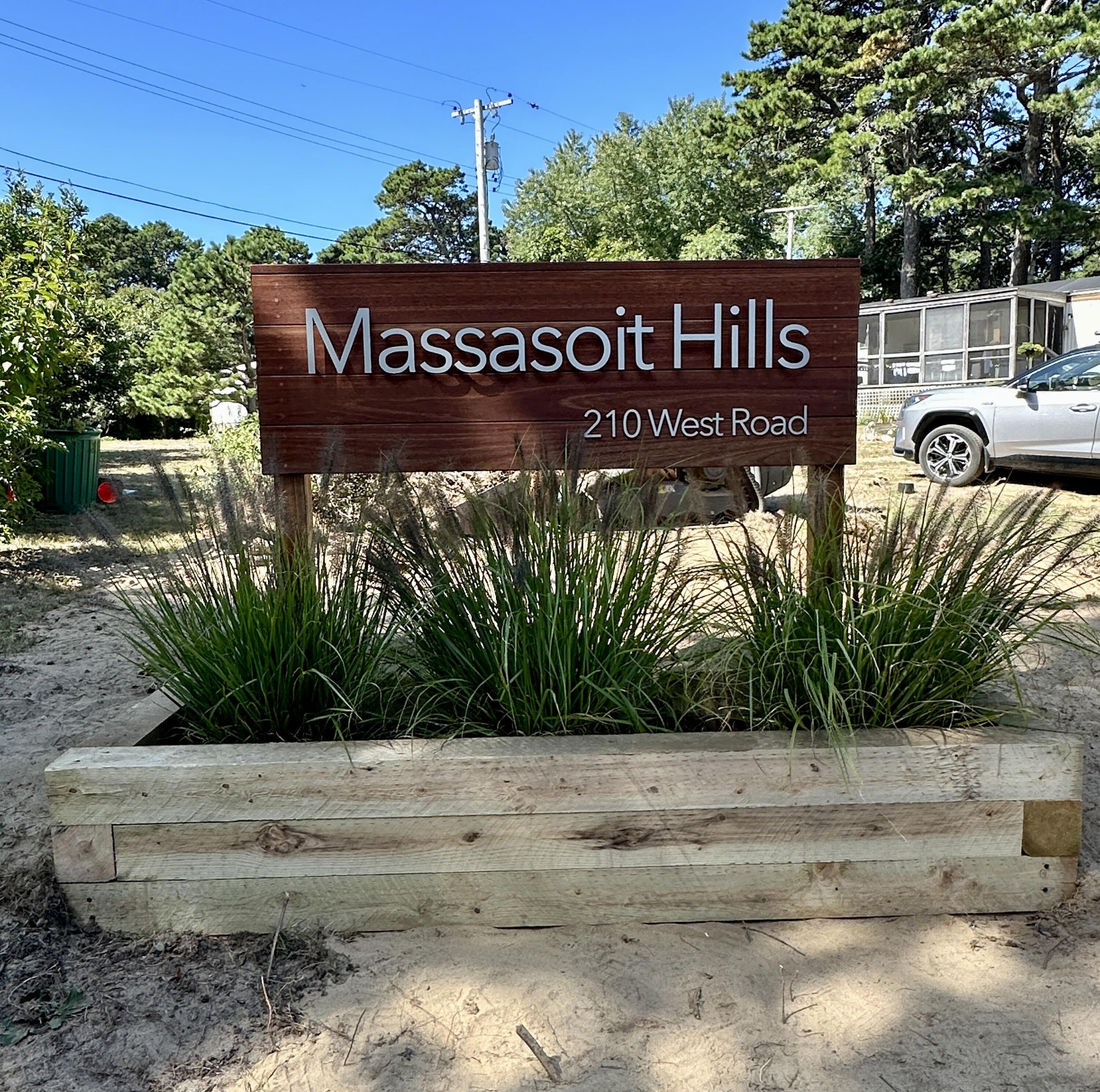 210 West Road, Unit E12 Wellfleet, MA 02667 - Photo 26 of 30 a view of outdoor space with sign board