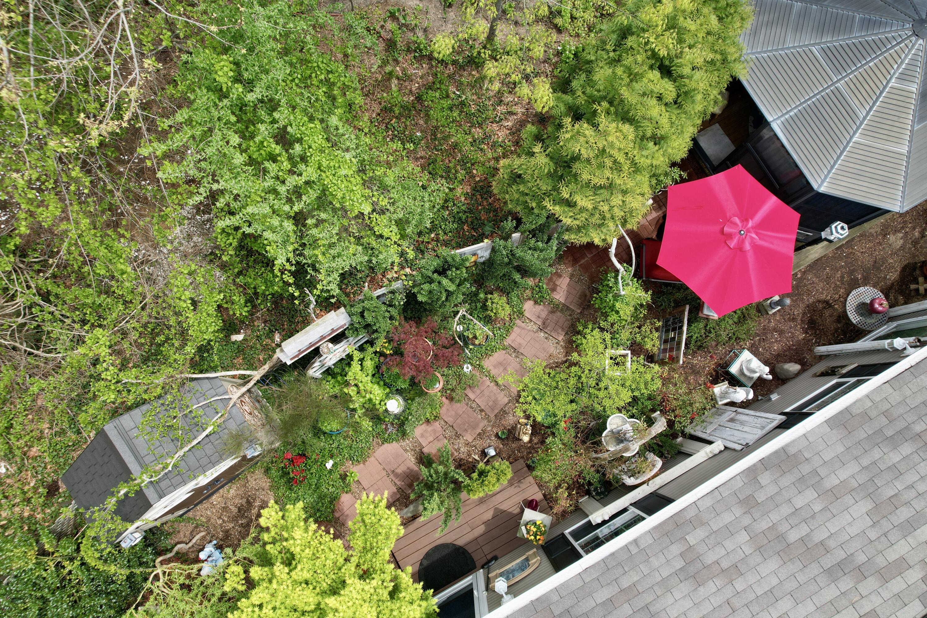 210 West Road, Unit E12 Wellfleet, MA 02667 - Photo 29 of 30 an aerial view of a house with a yard and tennis court