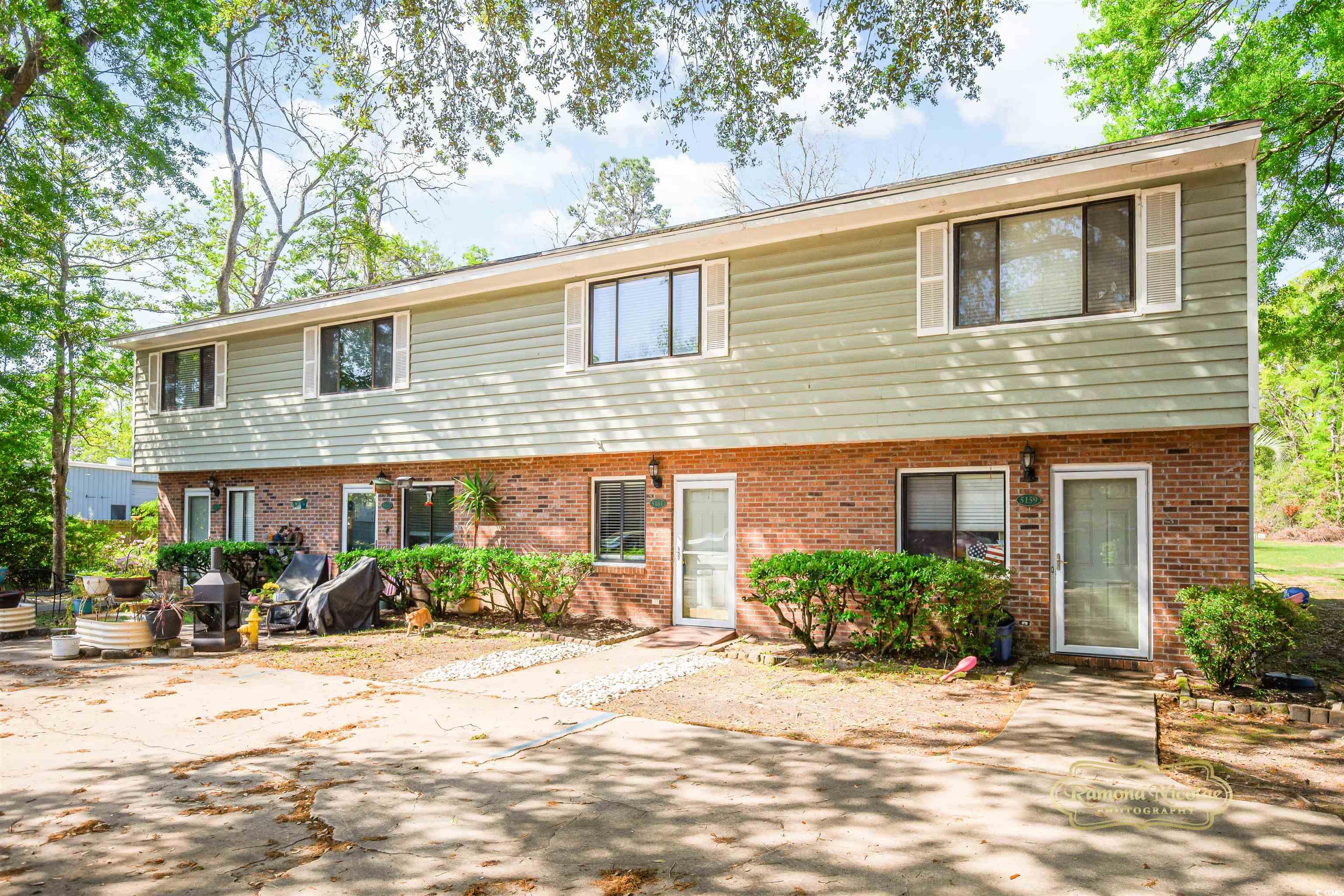 5161 Inlet Garden Court, Unit 8C Murrells Inlet, SC 29576 - Photo 1 of 31 Colonial inspired home featuring brick siding