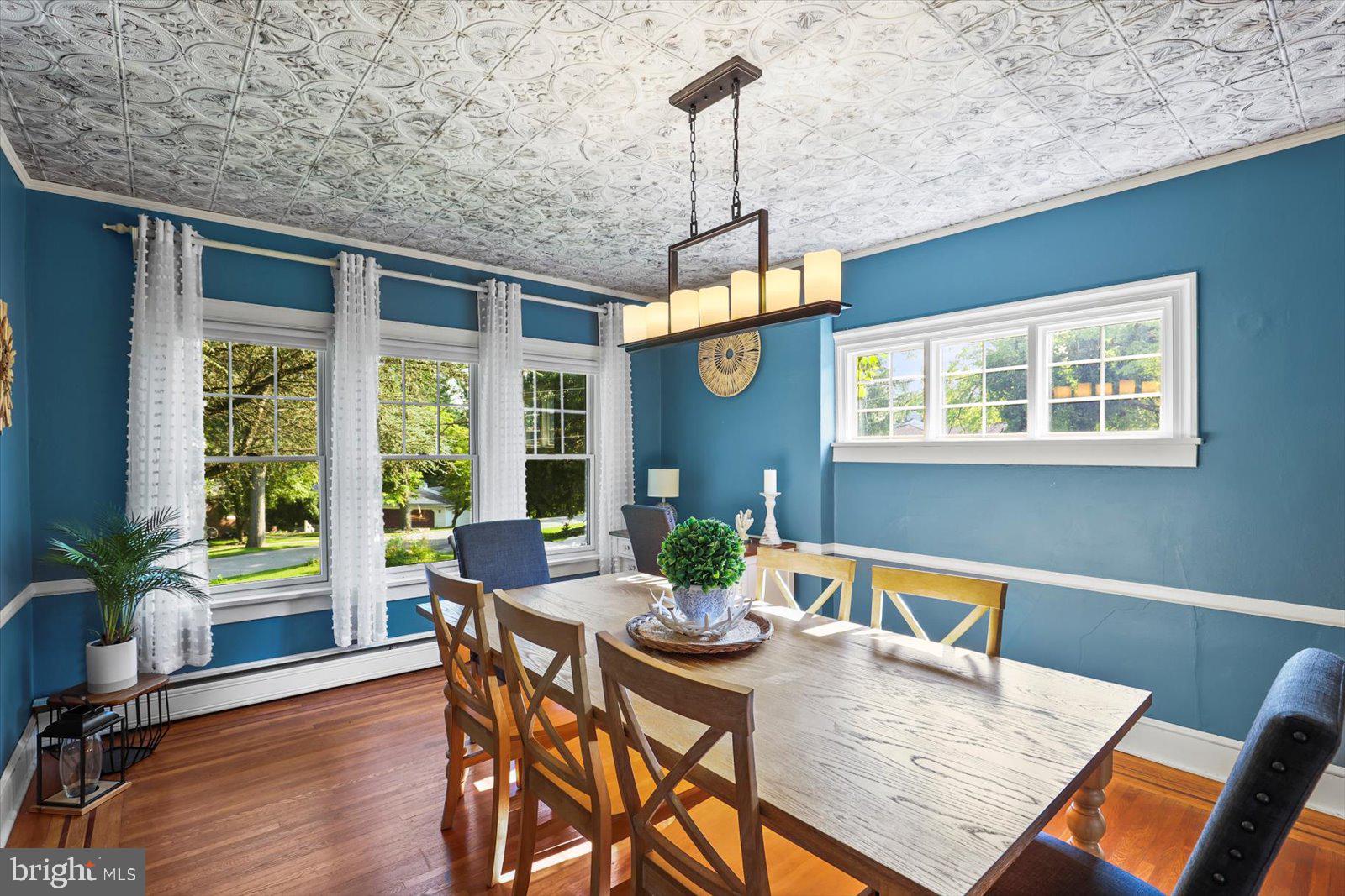 5222 Rockery Road Spring Grove, PA 17362 - Photo 12 of 51 a view of a dining room with furniture window and wooden floor