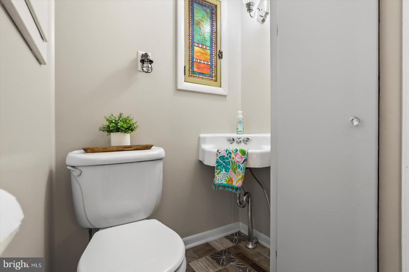 5222 Rockery Road Spring Grove, PA 17362 - Photo 9 of 51 a white toilet sitting next to a bathroom sink