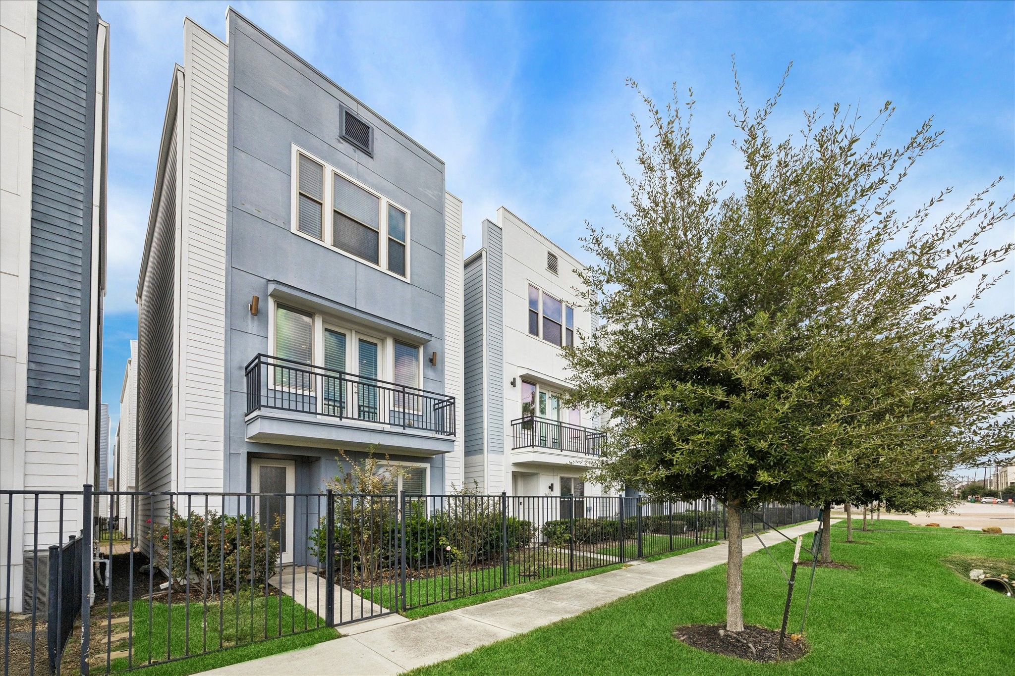 a view of a building with a yard