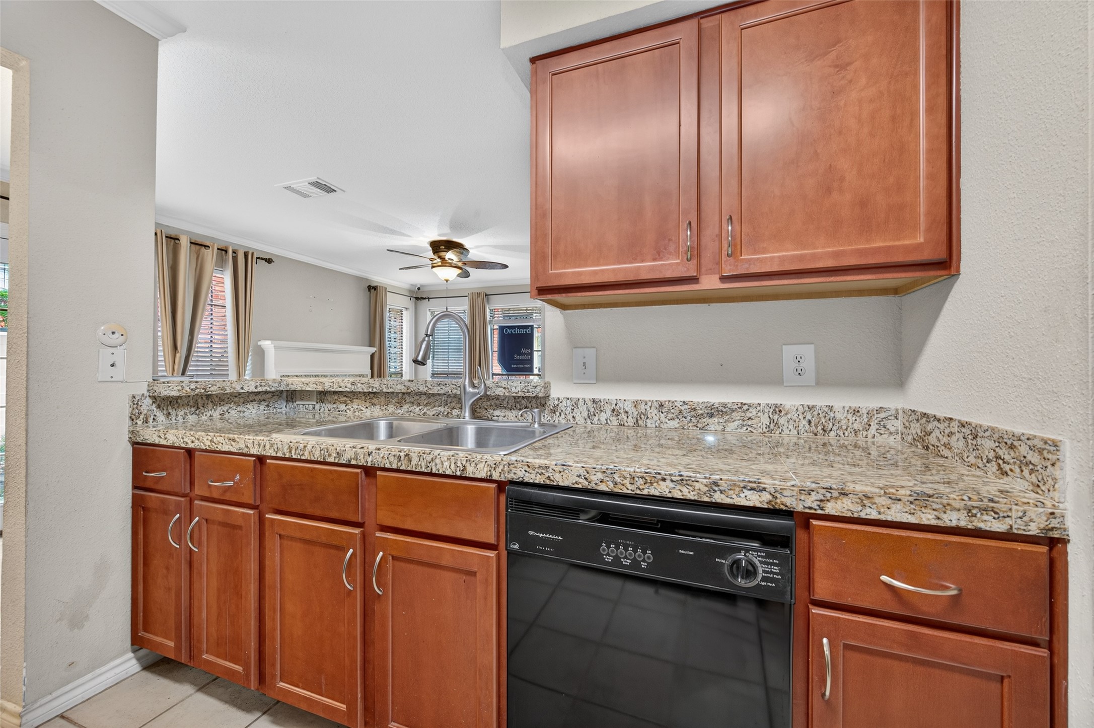 2211 South Kirkwood Road, Unit 49 Houston, TX 77077 - Photo 20 of 34 a kitchen with granite countertop a sink and cabinets
