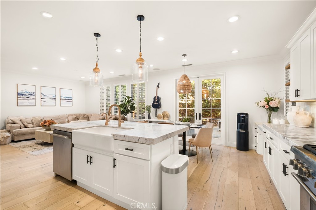 12 Ardennes Drive Ladera Ranch, CA 92694 - Photo 13 of 58 a open kitchen with stainless steel appliances granite countertop a sink and cabinets