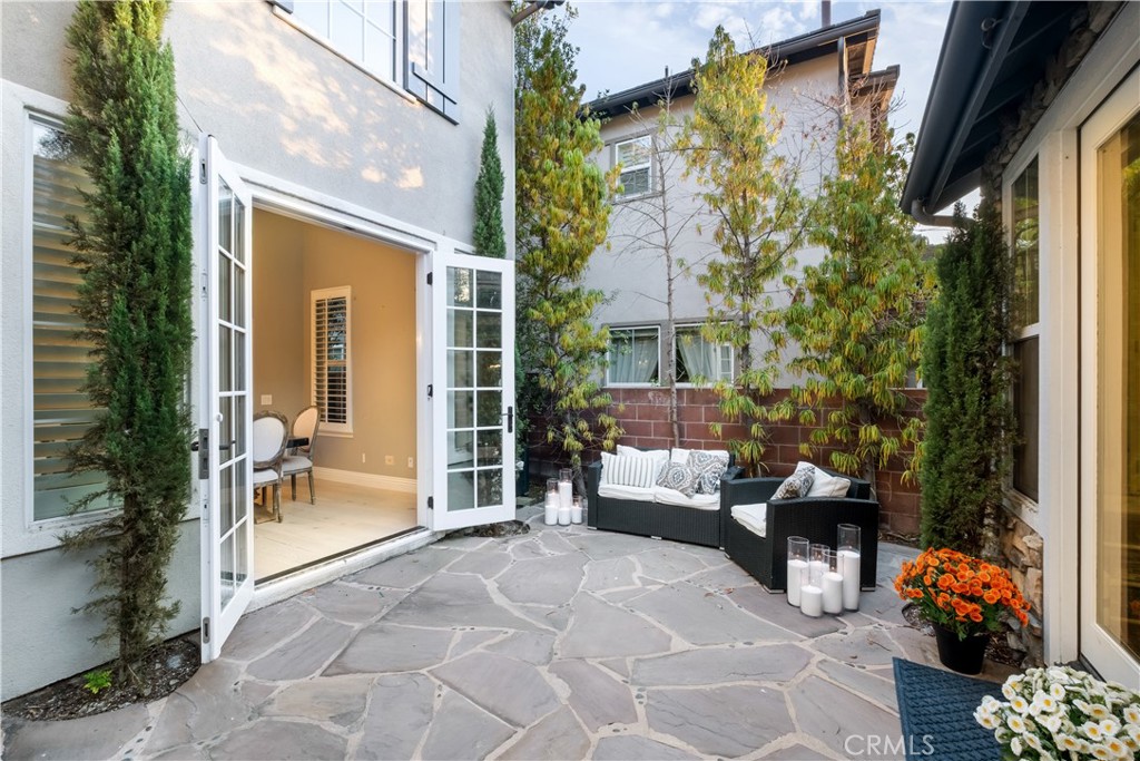 12 Ardennes Drive Ladera Ranch, CA 92694 - Photo 24 of 58 a view of living room with patio furniture and potted plants