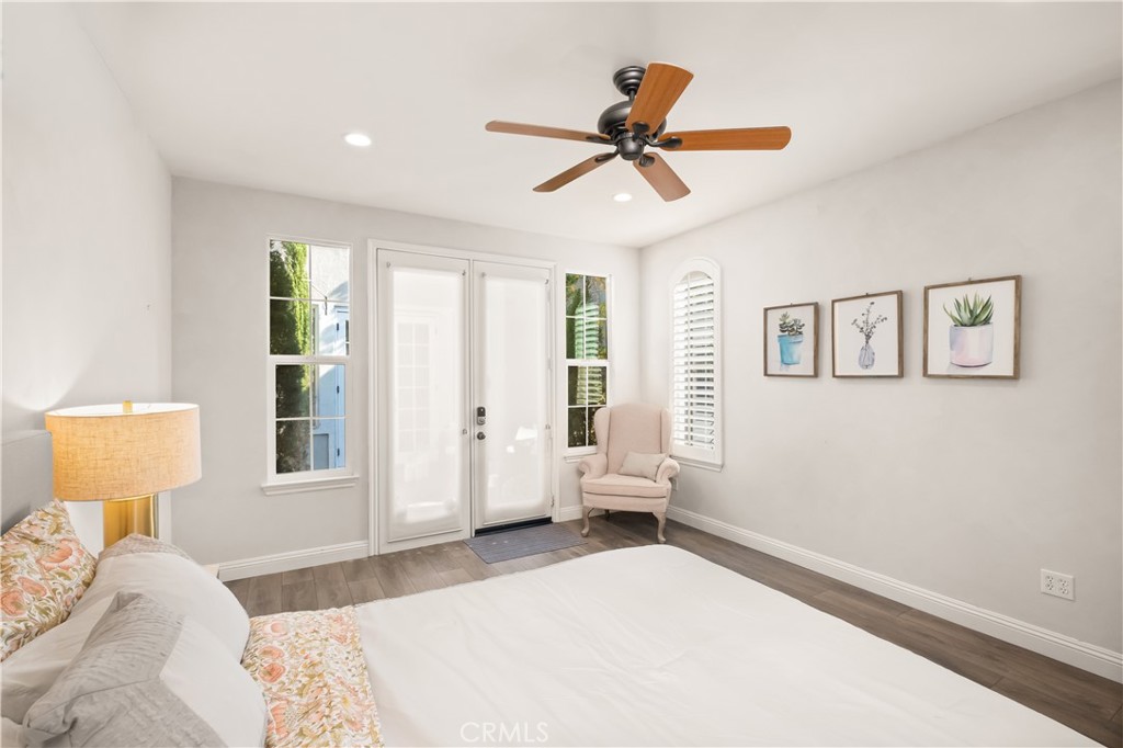 12 Ardennes Drive Ladera Ranch, CA 92694 - Photo 28 of 58 a bedroom with a bed and wooden floor