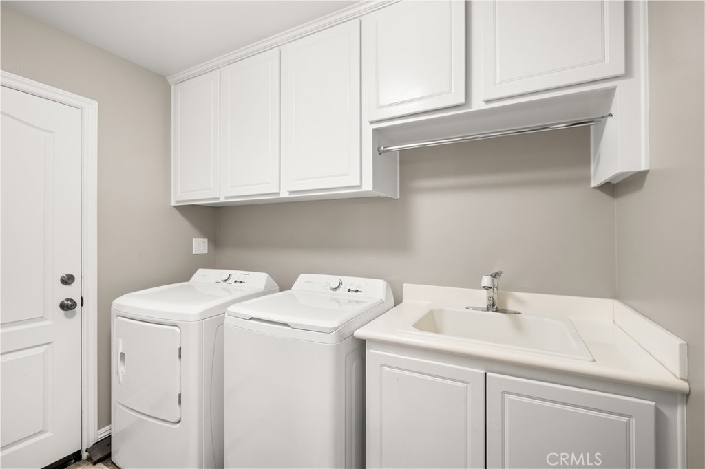 12 Ardennes Drive Ladera Ranch, CA 92694 - Photo 29 of 58 a utility room with dryer and washer