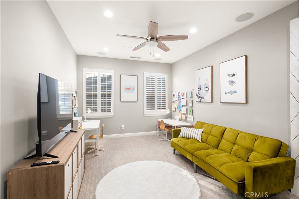 12 Ardennes Drive Ladera Ranch, CA 92694 - Photo 34 of 58 a living room with furniture and a flat screen tv