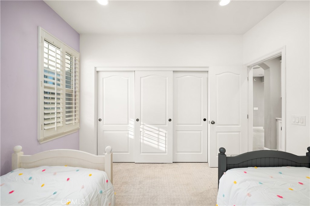 12 Ardennes Drive Ladera Ranch, CA 92694 - Photo 37 of 58 a bedroom with a bed and a window
