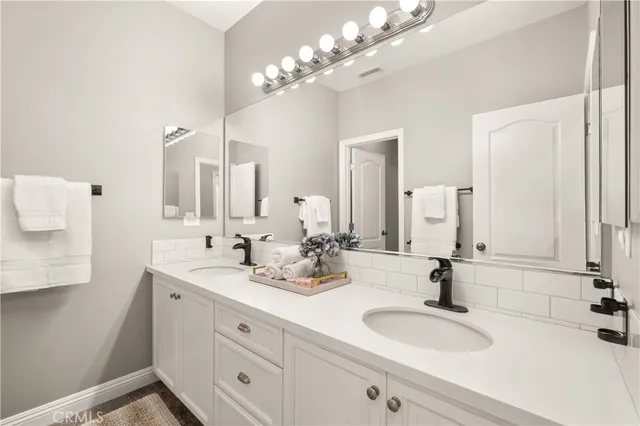 a view of backyard with sitting area