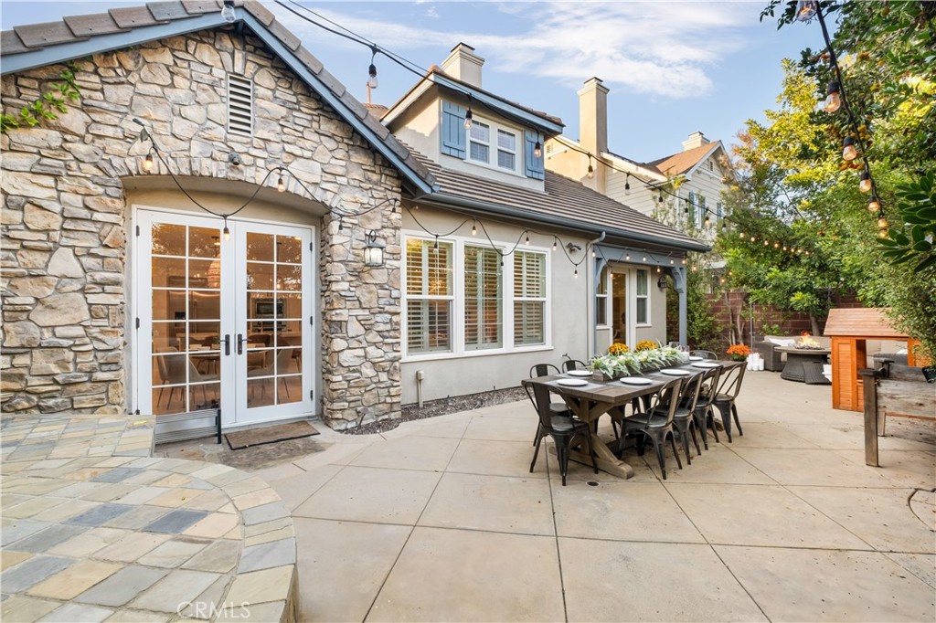 12 Ardennes Drive Ladera Ranch, CA 92694 - Photo 45 of 58 a view of a patio with table and chairs