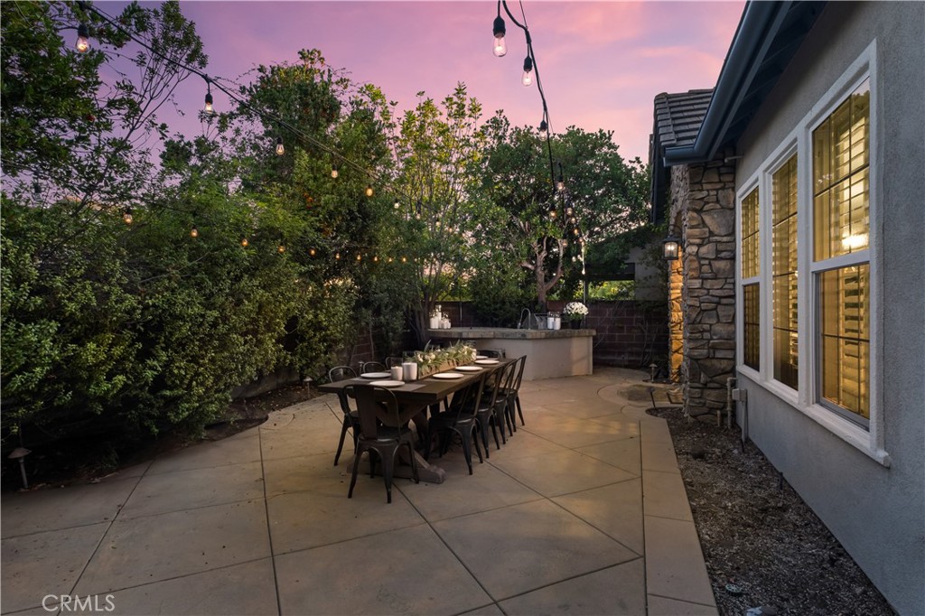 12 Ardennes Drive Ladera Ranch, CA 92694 - Photo 47 of 58 a view of a patio with table and chairs and potted plants