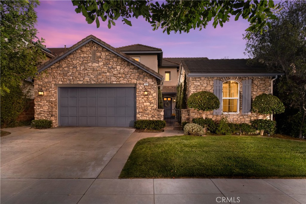 12 Ardennes Drive Ladera Ranch, CA 92694 - Photo 50 of 58 a front view of a house with a garden