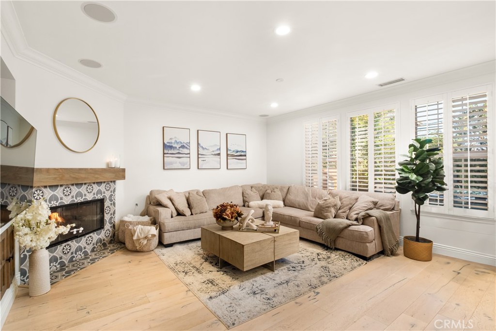 12 Ardennes Drive Ladera Ranch, CA 92694 - Photo 7 of 58 a living room with furniture and a fireplace