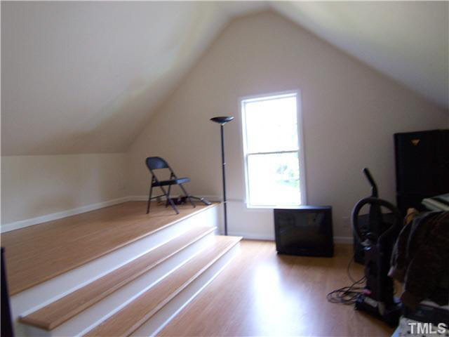 2408 Clerestory Place Raleigh, NC 27615 - Photo 14 of 25 a bedroom with furniture and a window