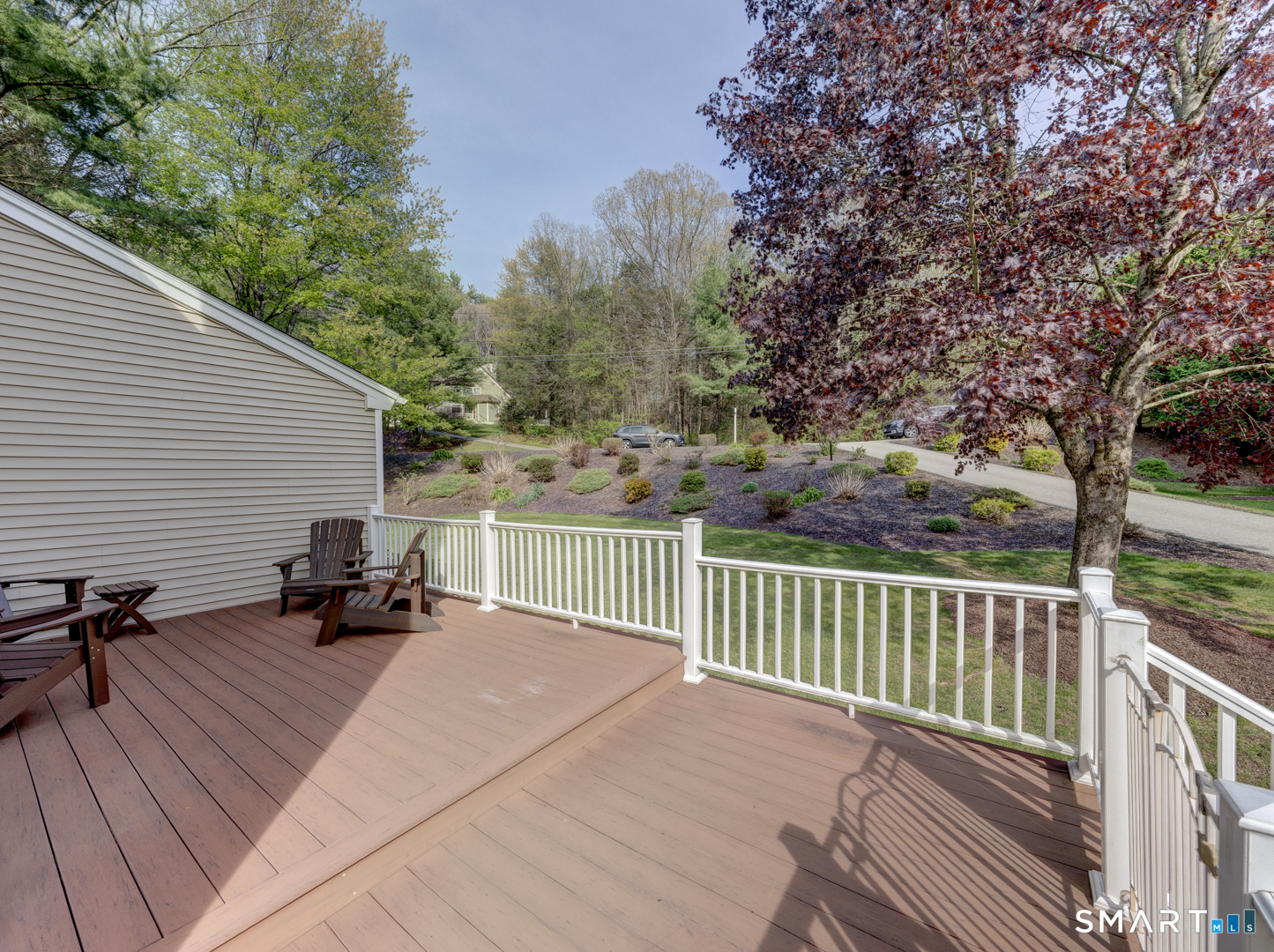 97 Lair Road New Hartford, CT 06057 - Photo 8 of 39 a view of a two chairs and table in the balcony
