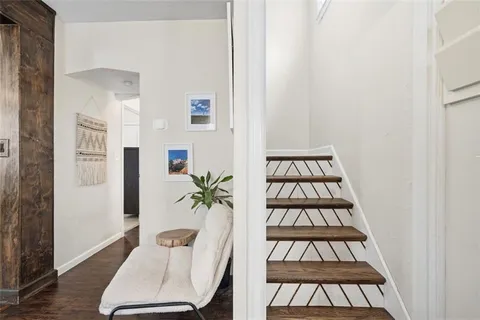 a view of entryway with wooden floor