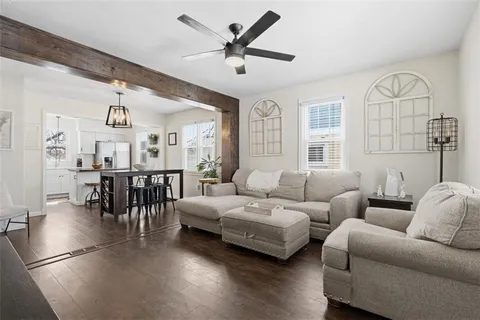 a kitchen with a table and chairs in it